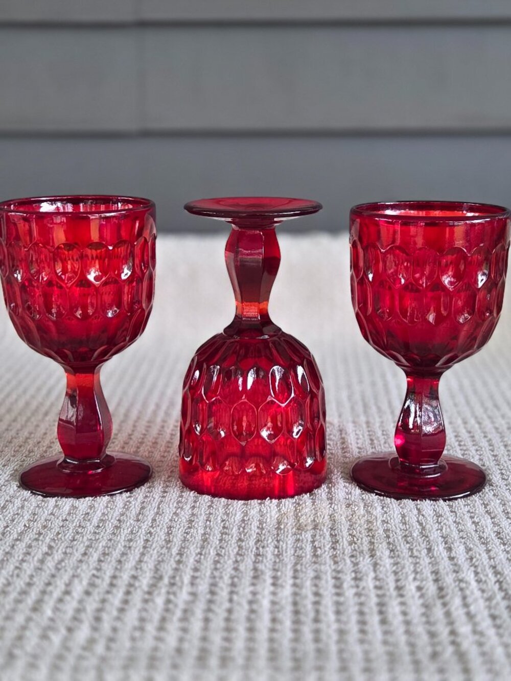 Set of 3 Ruby Red Fenton Footed Thumbprint Water Goblets Beverage Glasses 6.75”